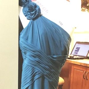 teal colored gown